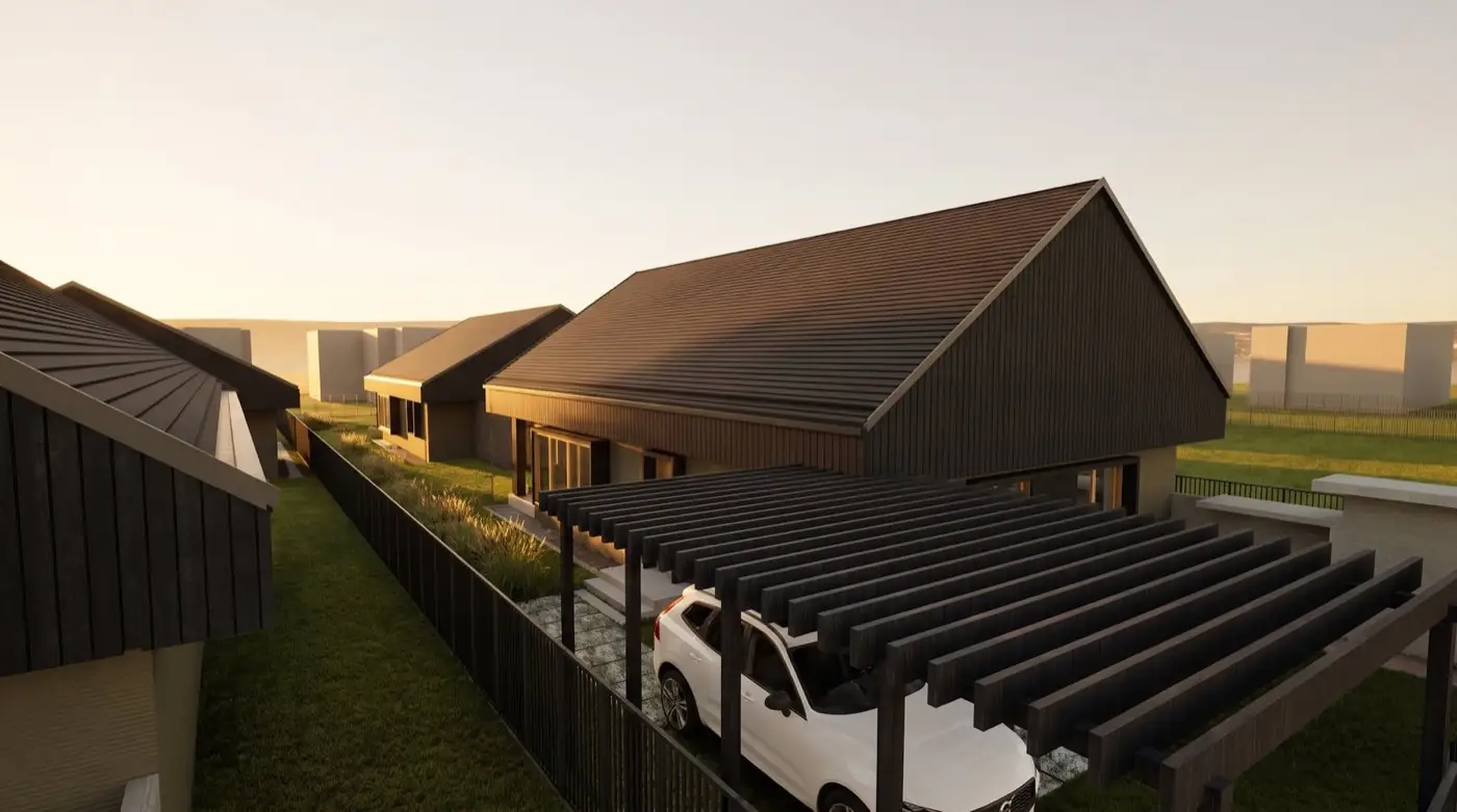 Ankunft: Holzpergola über dem Carport, dahinter die Fassade des Hauses aus verkohltem Holz